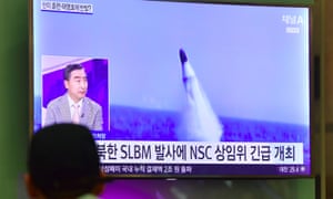 TV shows file footage of NK missile launch.