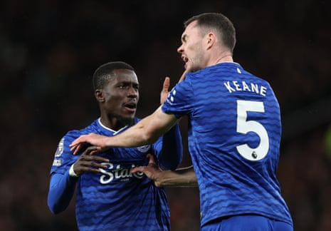 Idrissa Gueye slaps Everton teammate Michael Keane.
