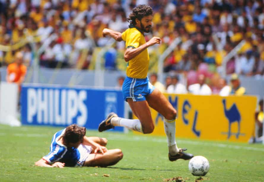 TravelGuides - ‘I miss talking to him’: Brazil’s Casagrande on 10 years without Sócrates | Sócrates 5 Sócrates evades a tackle from France’s Luis Fernández at the 1986 World Cup