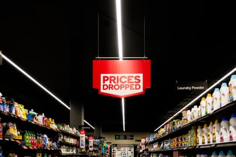 A prices dropped sign at a Woolworths supermarket in 2024