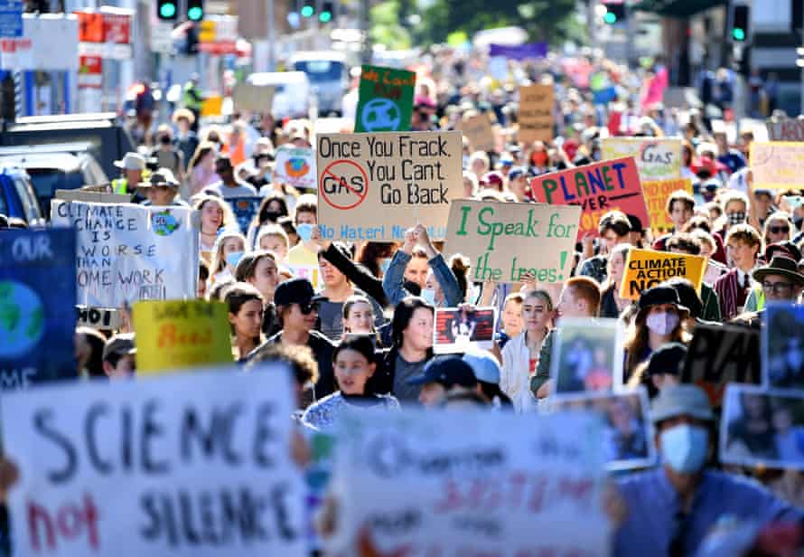 Climate strike protesters marching towards Queensland’s parliament building in Brisbane.