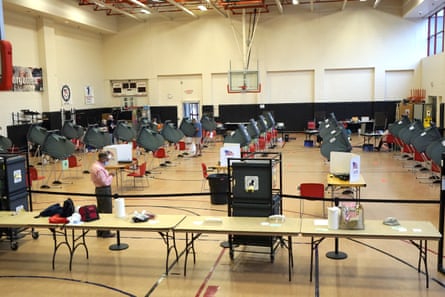 Voting booths are spaced out for social distancing at a polling site in Houston on June 29, 2020.