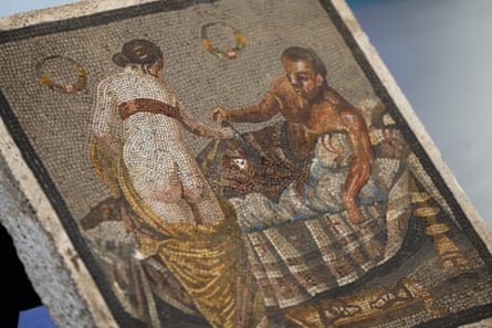 A mosaic depicting a man on a bed with a naked woman standing