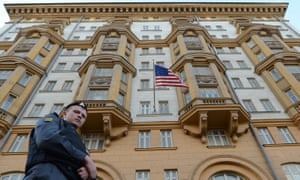 File photo of Russian police officer patrolling a street in front of the US embassy in Moscow