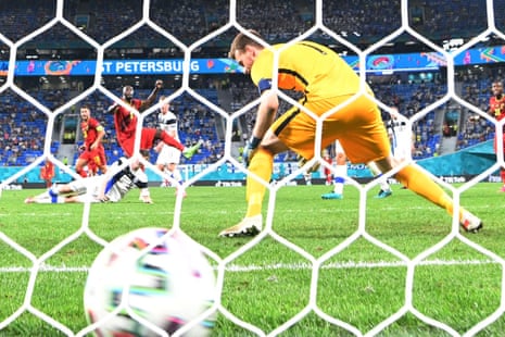 Belgium’s forward Romelu Lukaku scores past Finland’s goalkeeper Lucas Hradecky.