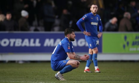 AFC Wimbledon’s Anthony Wordsworth looks dejected after the final whistle.