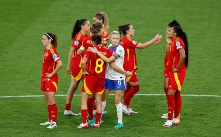 Leah Williamson consoles Spain’s players aft their shootout conclusion successful nan Euro 2025 final.