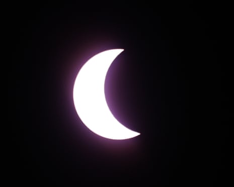 The Moon passes between the Earth and the Sun during the total solar eclipse, as seen from on board the Ambassador cruise ship Ambition, off the coast of Greenland