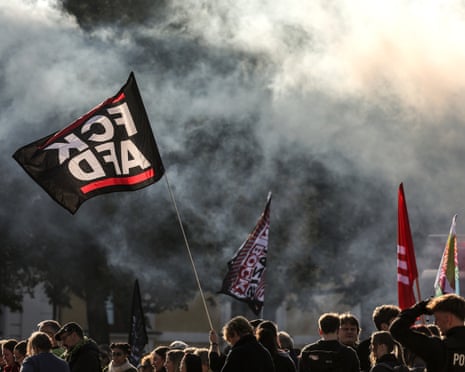 Demonstrators hold banners and flags during a protest against the far-right Alternative for Germany (AfD) party ahead of the constitutive session of Saxony-Anhalt's new state parliament, in Magdeburg, Germany.