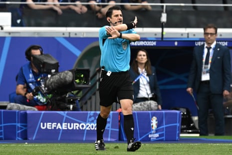 Turkish referee Halil Umut Meler leads today’s team of match officials in Berlin