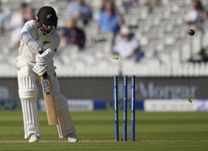 New Zealand’s Devon Conway is bowled by England’s Ollie Robinson.