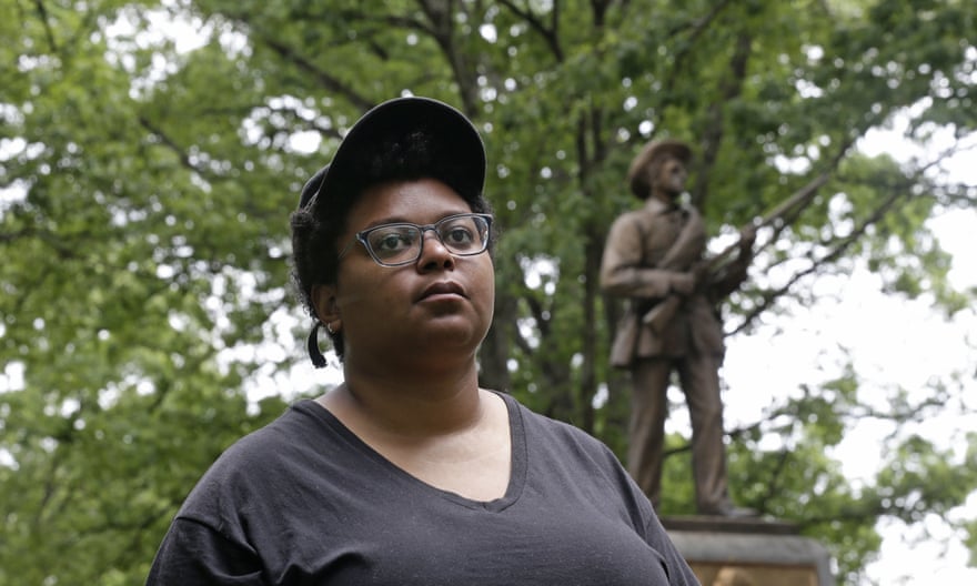 Activist Maya Little stands near the Silent Sam Confederate statue on campus at the University of North Carolina on 15 May.