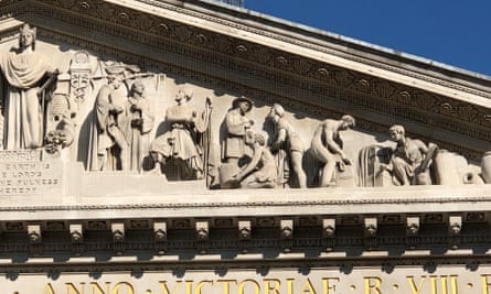 The pediment of the Royal Exchange in the City of London, which features an enslaved African man kneeling.