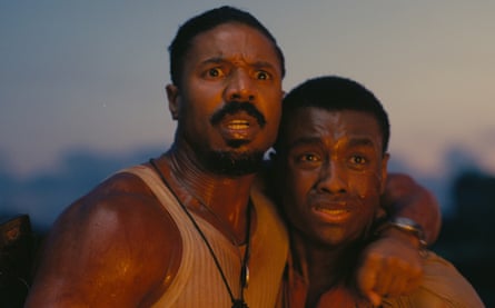 Michael B Jordan as Smoke and Miles Caton as Sammie Moore in Sinners.