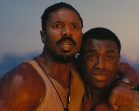 Michael B Jordan as Smoke and Miles Caton as Sammie Moore in Sinners.