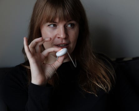 Madeleine Aggeler with the wearable AI device.