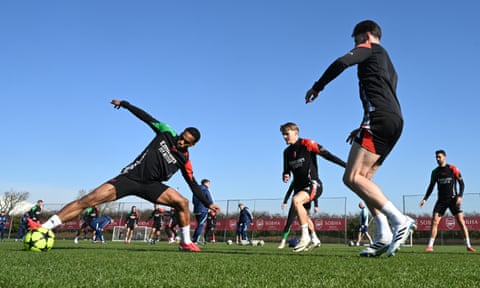 Jurriën Timber, Martin Ødegaard and Declan Rice during a training session before the Champions League match between PSV Eindhoven and Arsenal