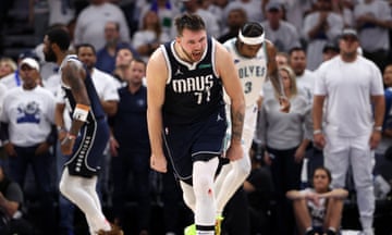 Dallas Mavericks guard Luka Dončić (77) celebrates after in the fourth quarter against the Minnesota Timberwolves on Wednesday in Game 1 of the Western Conference finals.