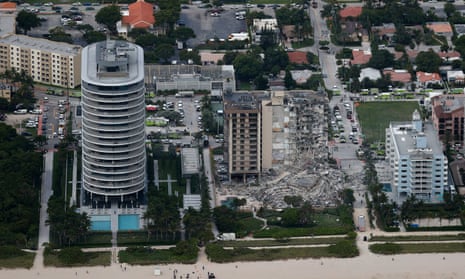 Residential Building In Miami Partially Collapsed<br>SURFSIDE, FLORIDA - JUNE 24:  Search and rescue personnel work in the rubble of the 12-story condo tower that partially collapsed on June 24, 2021 in Surfside, Florida. It is unknown at this time how many people were injured as search-and-rescue effort continues with rescue crews from across Miami-Dade and Broward counties. (Photo by Joe Raedle/Getty Images)