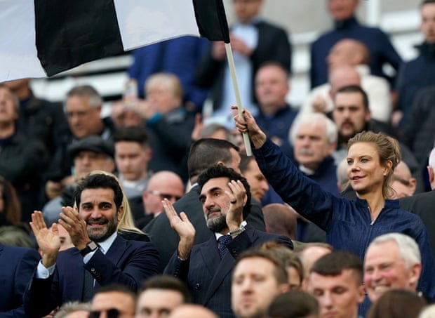 Yasir al-Rumayyan, the Saudi chairman of Newcastle (centre), with the directors Amanda Staveley and Mehrdad Ghodoussi at St James’ Park last month.