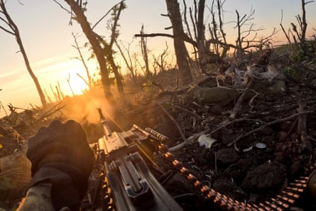 A Ukrainian servicemen fires towards Russian positions in 2000 Meters to Andriivka.