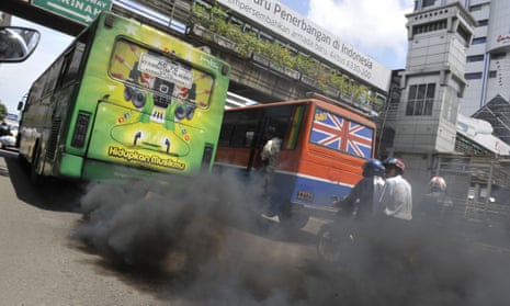 A commuter bus running on diesel fuel emits thick trail of pollutants in Jakarta. New research shows that when people understand that humans are causing global warming, they’re more likely to be concerned about the problem.