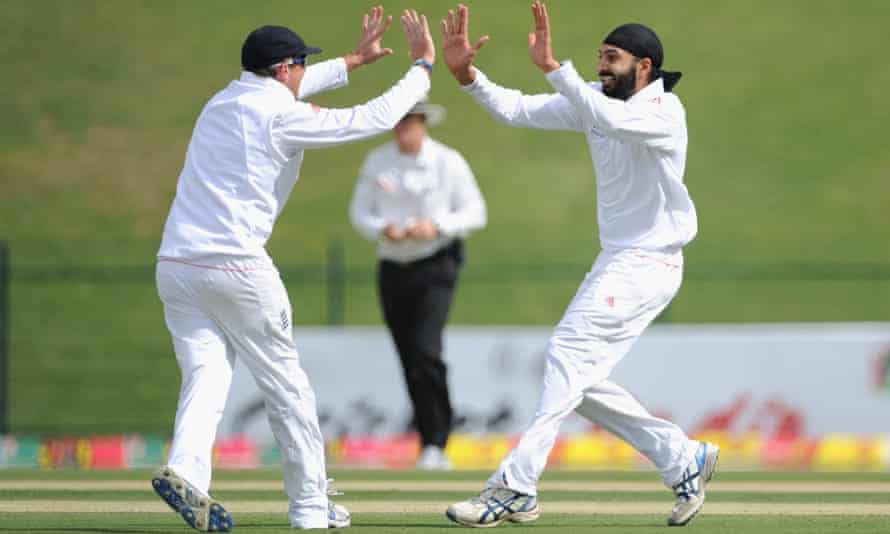 Monty Panesar celebrates with Graeme Swann after taking one of his 167 Test wickets for England