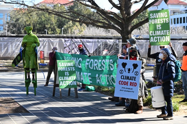 Environmental activists protest outside the National Press Club