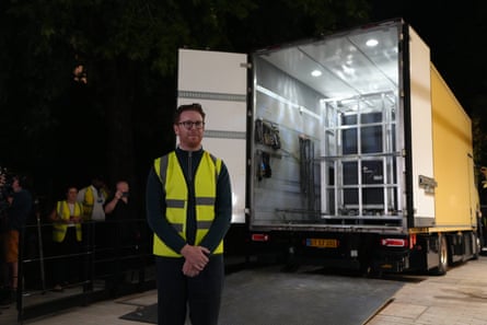 Nicholas Cullinan standing in front of lorry in hi-vis