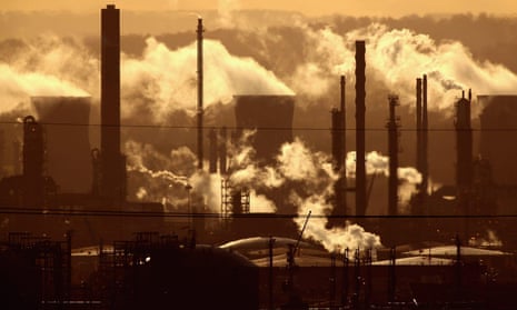 Smoke billows from the the Grangemouth oil refinery in Scotland in 2009. Are fossil fuel assets being overvalued?
