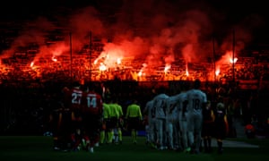 Young Boys are throwing flares to bring the players to the area.
