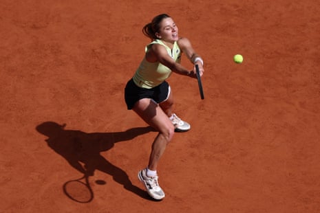Maja Chwalinska plays a backhand to Mirra Andreeva.