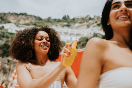 Experts say to apply spray sunscreens “until an even sheen appears on the skin”.