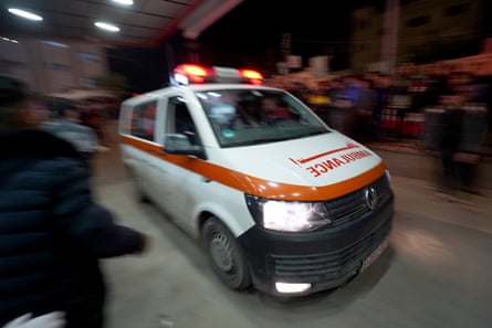 Injured Palestinians, including children, are brought to Nasser Hospital to receive medical treatment following Israeli attacks in Khan Yunis.