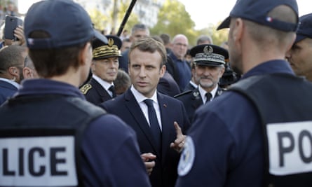 President Emmanuel Macron with police officers, 2017.
