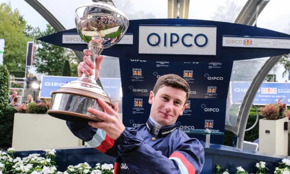 Oisin Murphy celebrates becoming champion jockey during the British Champions Day at Ascot.