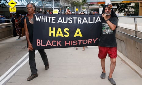 People attend a protest for Aboriginal rights. Indigenous advocates say while Australia signed the declaration on the rights of Indigenous peoples in 2007, it has yet to fully implement and respect the right to self-determination.