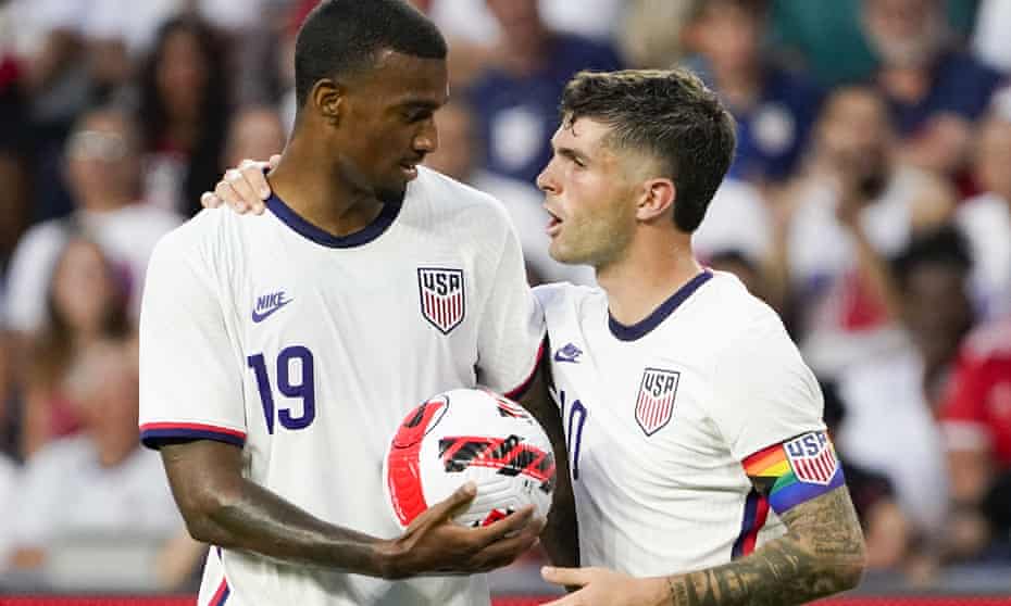 Christian Pulisic, right, hands the ball to Haji Wright  prior to a penalty during the US victory over Morocc
