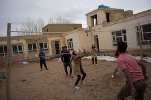 Members of the Bamyan Ski Club enjoy playing volleyball at their club house/offices in Bamyan.