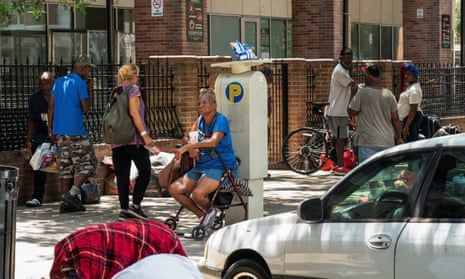 People react to a period of hot weather in HoustonHomeless people stay under the shades of the trees to escape the heat during hot weather in Houston, Texas, U.S. June 28, 2023. 