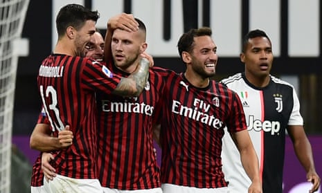 Ante Rebic celebrates with his teammates after scoring his goal, and Milan’s fourth, 10 minutes from time