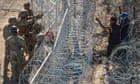 Texas troops clash with migrants over barbed-wire breach at US border