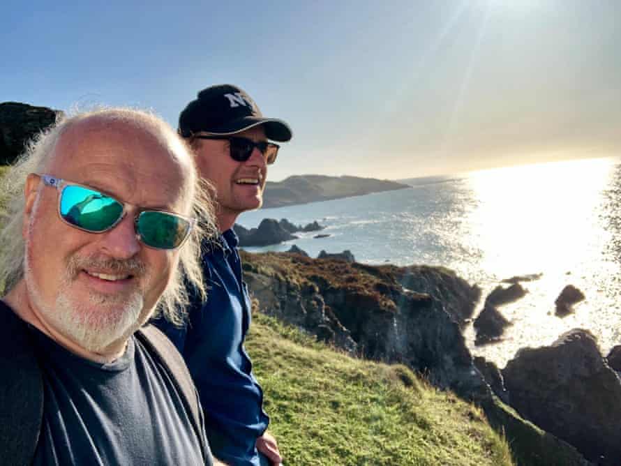 Bill Bailey walking with Sean Lock at Bull Point, Devon, in 2019.