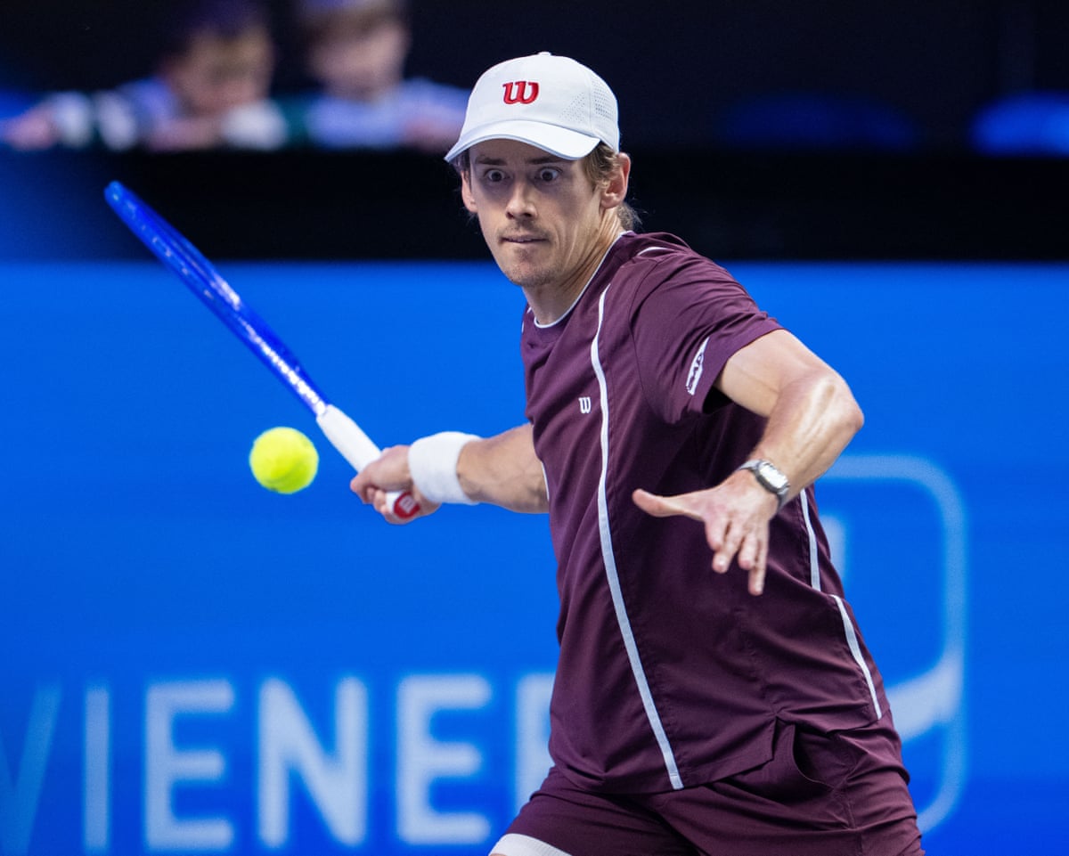 Australia’s Alex de Minaur returns the ball to Italy’s Matteo Berrettini at the Vienna Open