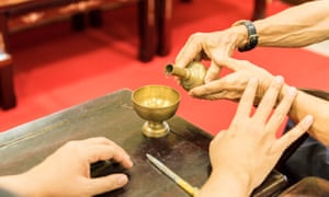 Part of the Buddhist ceremony involves family members transferring water from one container to another in order to dedicate merit for the deceased pet. Once finished, the water is returned to the ground in a tradition similar to a proper Buddhist funeral. For family members the ceremony promotes forgiveness in order to reduce bad karma for the deceased pet.
