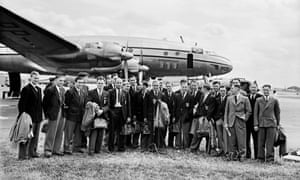 England’s squad stand in front of their Lockheed Constellation before their long flight to Brazil