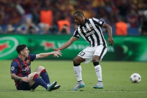 Patrice Evra helps Lionel Messi to his feet by during the 2015 Champions League final between Barcelona and Juventus.