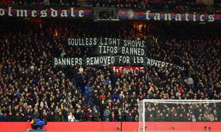 Crystal Palace fans’ banners show their discontent with the club