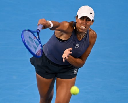 Madison Keys serves.