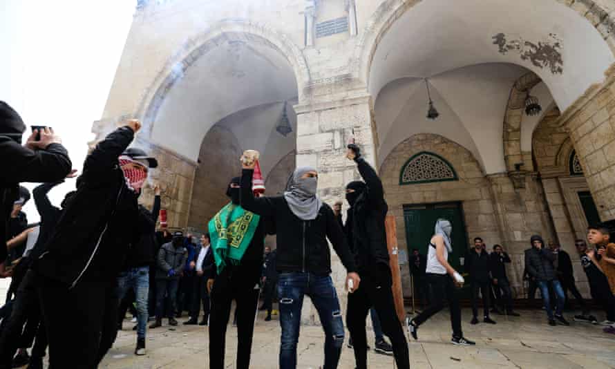 Palestinians in the al-Aqsa compound on Sunday